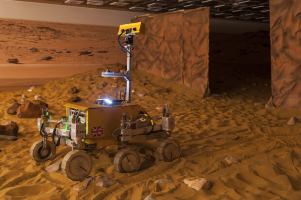 Controlling rovers on planetary surfaces from an orbiting spacecraft