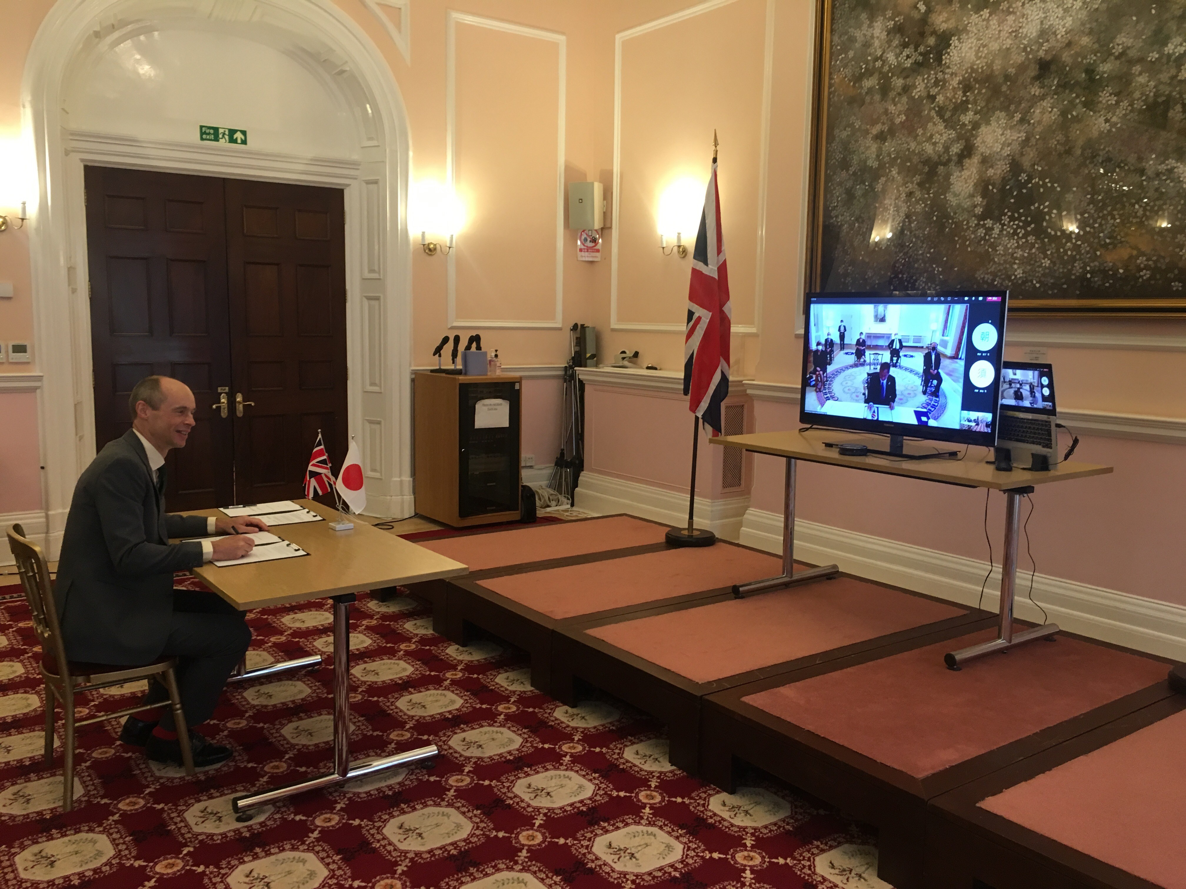 UK Space Agency CEO, signing a Memorandum of Cooperation with the Japanese Aerospace Exploration Agency (JAXA). 