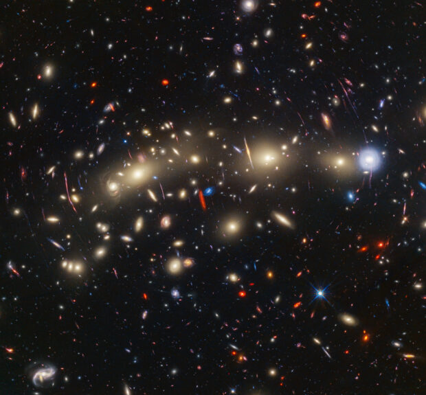 Galaxy cluster “MACS0416” also known as the ‘Christmas Tree Galaxy Cluster’. Credit: NASA, ESA, CSA, STScI.