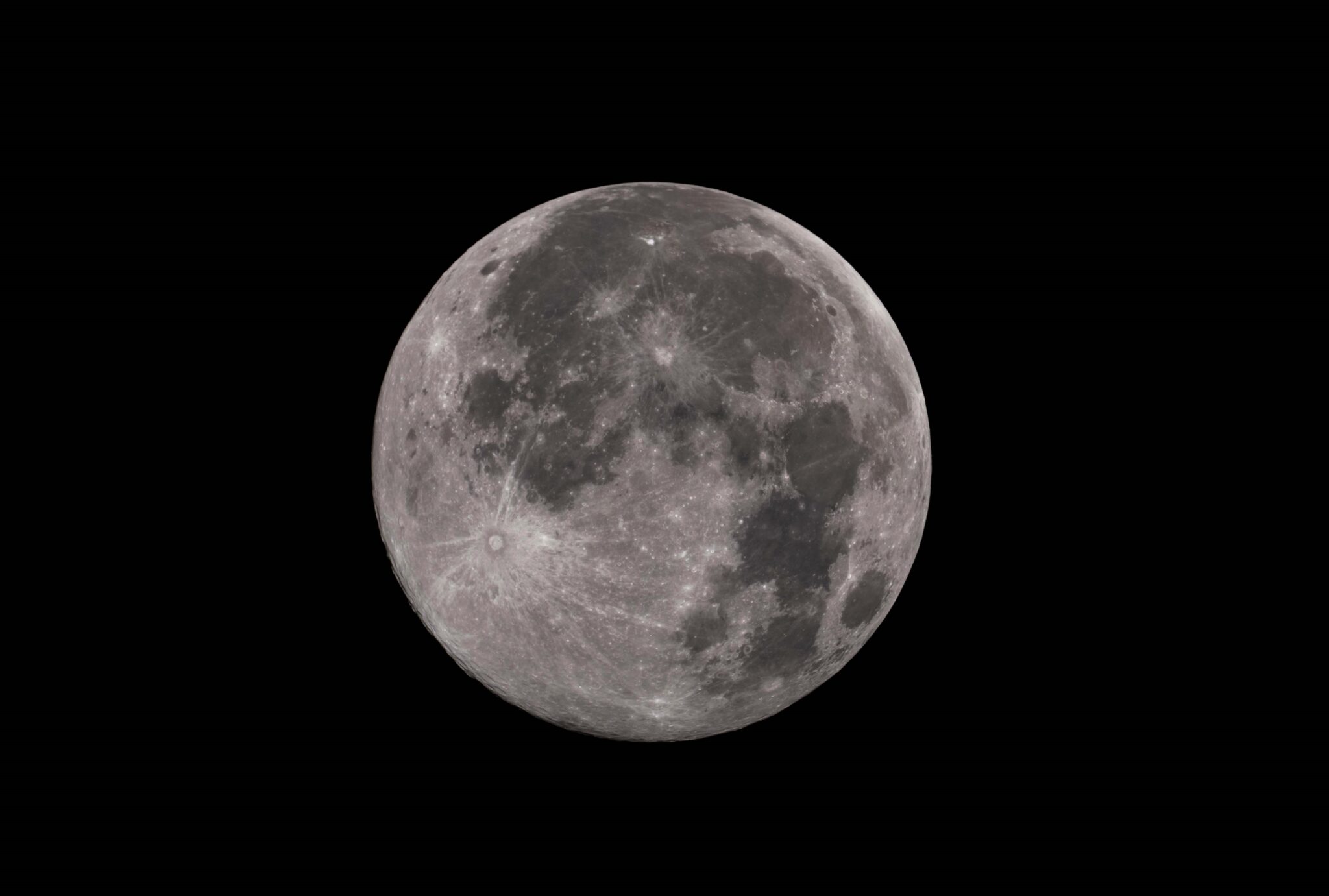 A partial penumbral lunar eclipse and the PonsBrooks comet the UK